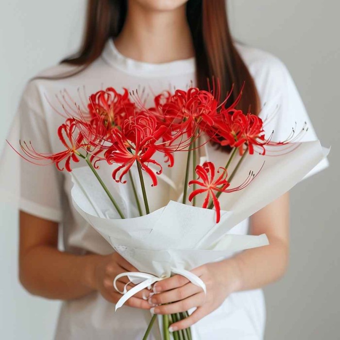 Букет 7 красных паучьих лилий