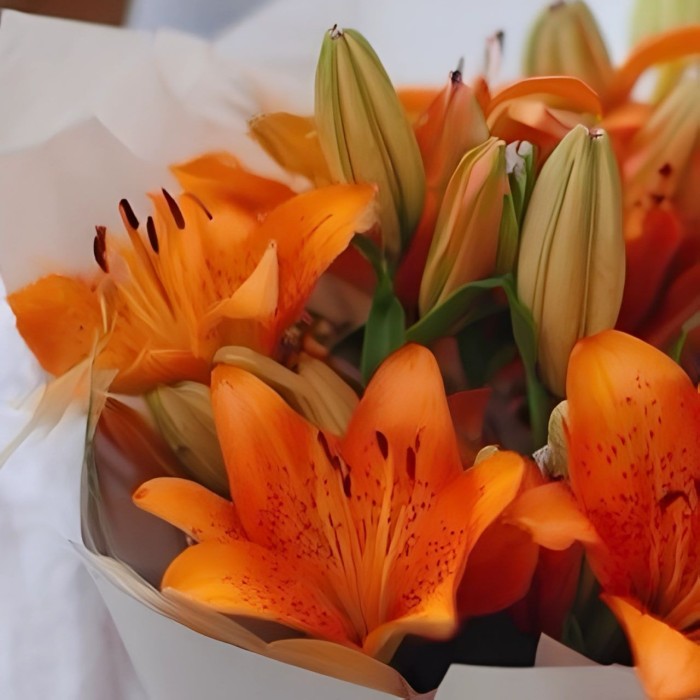 Букет 3 оранжевые лилии